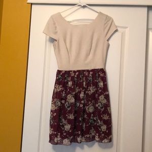 Cream dress with maroon floral at the bottom